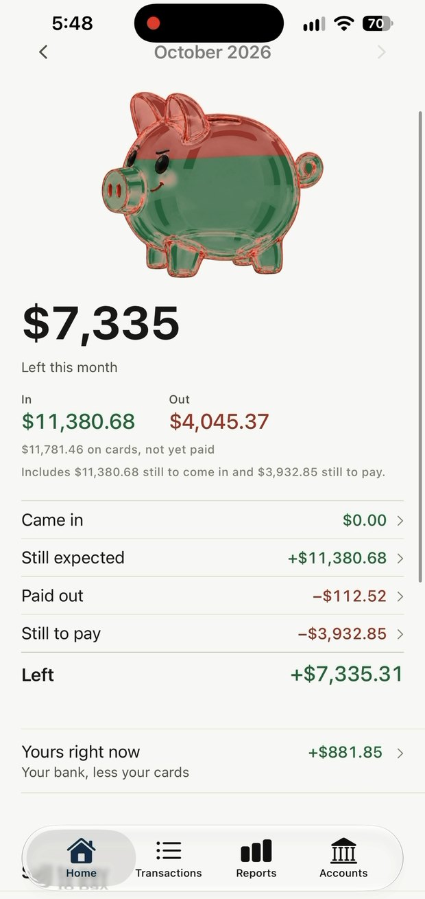 The app's home screen with the month's figures